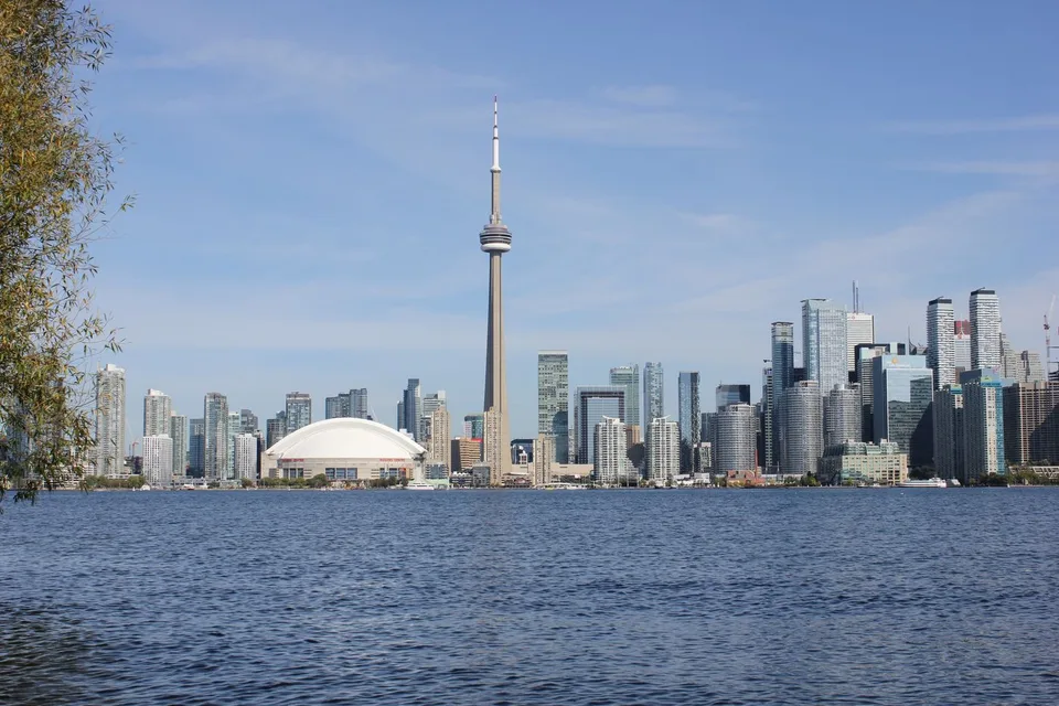 Toronto waterfront and CN Tower under a clear sky